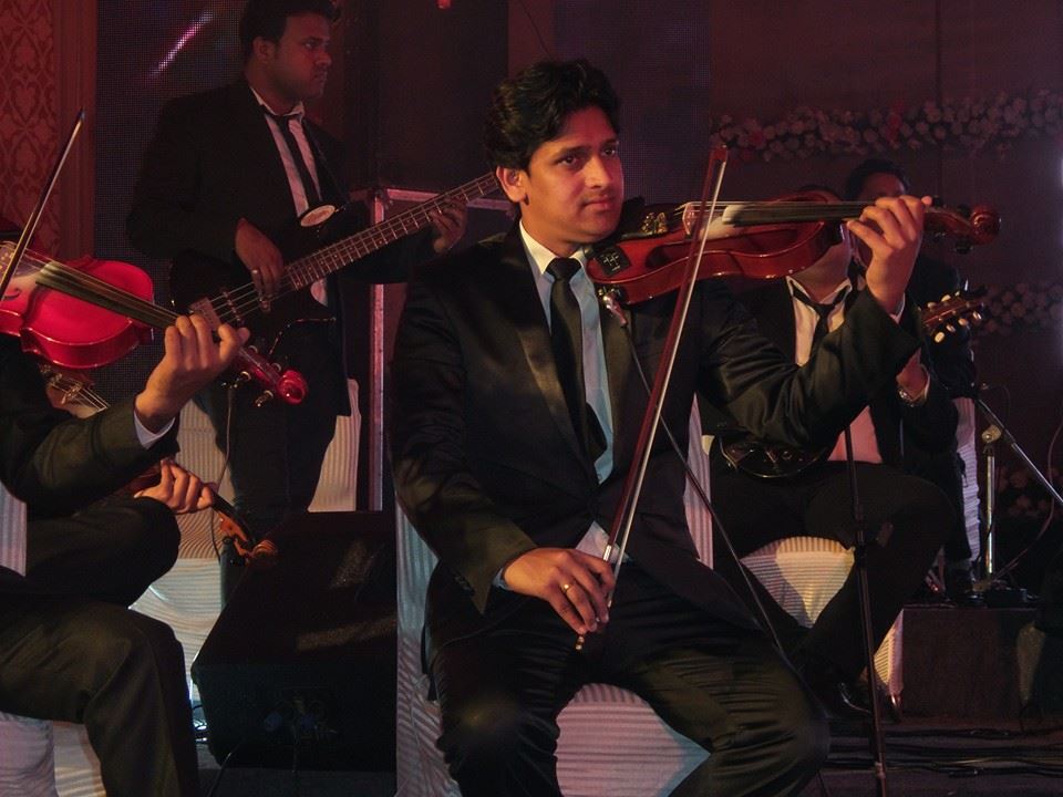 male violin players Abu Dhabi Uae